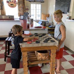 Crossroads Merchantile - Kids Enjoy a game of checkers after we eat...