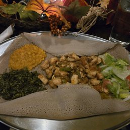 Doro Tibs with Gomen, Kik Alitcha, and salad Doro Tibs with Gomen, Kik Alitcha, and salad