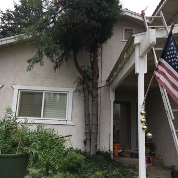 Green Valley Landscaping - an american flag in front of a house - Landscaping Near Me Green Valley Landscaping - an american flag in front of a house - Landscaping Near Me