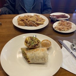 Breakfast burrito and apple cinnamon pancakes (background)