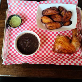 Lechón Latin BBQ & Bar - 1/4 chicken, black beans, plantains, aji verde - Latin American Near Me - Raleigh, North Carolina Lechón Latin BBQ & Bar - 1/4 chicken, black beans, plantains, aji verde - Latin American Near Me - Raleigh, North Carolina
