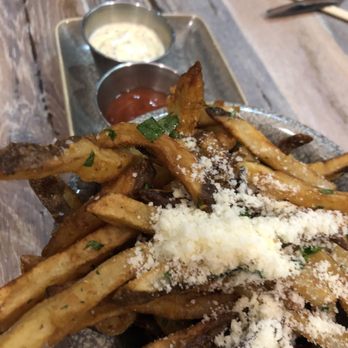 Moku Kitchen - Parmesan garlic oil fries - Cocktail Bars Near Me - Honolulu, Hawaii Moku Kitchen - Parmesan garlic oil fries - Cocktail Bars Near Me - Honolulu, Hawaii