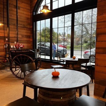 Wren's Nest Baking - Seating area with wagon. - Bakeries Near Me - Ruston, Washington Wren's Nest Baking - Seating area with wagon. - Bakeries Near Me - Ruston, Washington