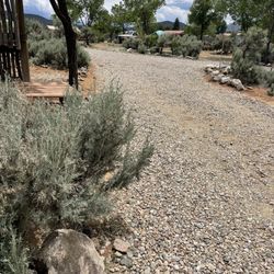 Taos Valley Rv Park - Level gravel spaces.