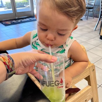 Fuego Cravings - Our little guy enjoying a pepino agua fresca. - Mexican Near Me - Rancho Cucamonga, California