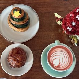 Santa's latte, Christmas Spirit pastry, and Kouign Amann pastry. Santa's latte, Christmas Spirit pastry, and Kouign Amann pastry.