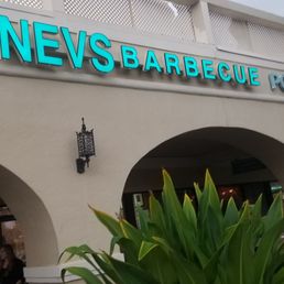 Exterior outside entrance of NEVS Barbecue - Palm Beach Gardens, Florida Exterior outside entrance of NEVS Barbecue - Palm Beach Gardens, Florida