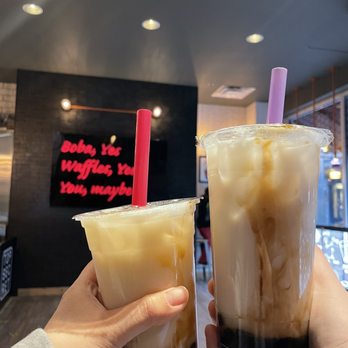 Bubbleology - a person holding a cup of iced coffee - Bubble Tea Near Me - Clinton Township, Michigan Bubbleology - a person holding a cup of iced coffee - Bubble Tea Near Me - Clinton Township, Michigan