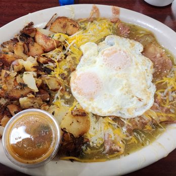 Rodeo Cafe - Huevos Ranchero with over easy eggs. Rodeo potatoes - Breakfast & Brunch Near Me - Corona, California Rodeo Cafe - Huevos Ranchero with over easy eggs. Rodeo potatoes - Breakfast & Brunch Near Me - Corona, California