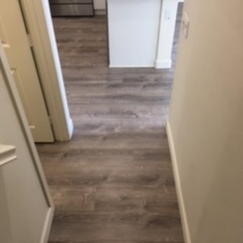 JM Construction - Hallway into Kitchen from upstairs - Flooring Near Me