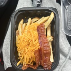 Baconator fries???  This is insane to be giving when it used to be bacon pieces and cheese melted entirely , very sad by this