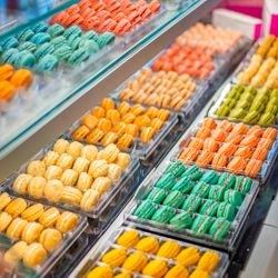 Le Macaron French Pastries - Discover a colorful selection of authentic French macarons, available in a variety of delicious flavors.