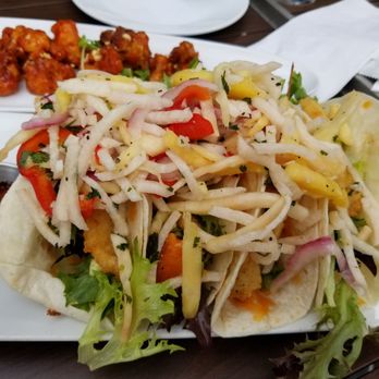 Kellys Landing - S.O.T. FISH TACOS
grilled pineapple and jicama slaw, cheddar, avocado crema, smoked chili sauce ($16) - Sports Bars Near Me - Toronto, Ontario Kellys Landing - S.O.T. FISH TACOS
grilled pineapple and jicama slaw, cheddar, avocado crema, smoked chili sauce ($16) - Sports Bars Near Me - Toronto, Ontario