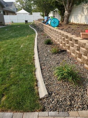 Retaining Wall Installation - If you're dealing with flooding and soil erosion issues, a retaining wall installation might be the solution you're looking for. To discuss whether a retaining wall is right for your property, get in touch with Idacrest Landscaping. We can take a look at your outdoor space to see if it could benefit from a retaining wall.
Request a free estimate for our retaining wall services by reaching out to our Nampa, ID-based team. Retaining Wall Installation - If you're dealing with flooding and soil erosion issues, a retaining wall installation might be the solution you're looking for. To discuss whether a retaining wall is right for your property, get in touch with Idacrest Landscaping. We can take a look at your outdoor space to see if it could benefit from a retaining wall.
Request a free estimate for our retaining wall services by reaching out to our Nampa, ID-based team.