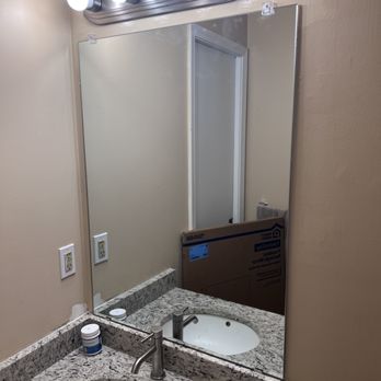 NAH Solutions - Replaced mirror and faucet after old mirror fell off the wall and broke the faucet. - Handyman Near Me
