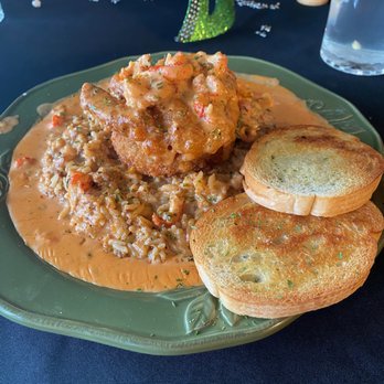 Danni's New Orleans Eatery - Deep Dirty South - Crawfish étouffée in a weirdly sweet cream sauce over a catfish filet and crab cake on top a salt-lick dirty rice. - Cajun/Creole Near Me - Sherman, Texas Danni's New Orleans Eatery - Deep Dirty South - Crawfish étouffée in a weirdly sweet cream sauce over a catfish filet and crab cake on top a salt-lick dirty rice. - Cajun/Creole Near Me - Sherman, Texas