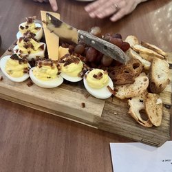 Le Petit Bijou by Domaine South - Charcuterie board (cheese, grapes, toasted almonds, crostini) + deviled egg appetizer