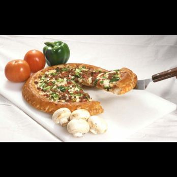 Pizza Pro - a slice of pizza on a white plate - Pizza Near Me - Bathurst, New Brunswick