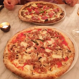 Gluten free sausage and mushroom pizza