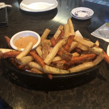Yoshi's - Order: Yoshi 's Garlic Fries - Jazz & Blues Near Me - Oakland, California