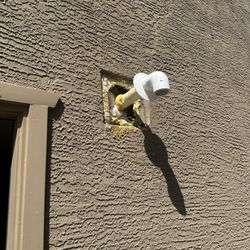 Arizona Delta Mechanical - Spray foam all over the stucco.