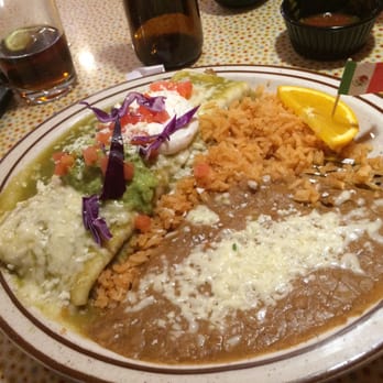 Mi Pueblo - 1 specialty dish: 1 carnitas burrito with rice and refried beans. (Specialty dish comes with guacamole and sour cream) - Mexican Near Me - Copperopolis, California