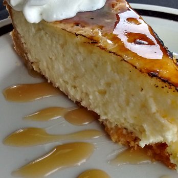 Traditions Restaurant - a slice of cheesecake with whipped cream - American Near Me - Indianola, Iowa Traditions Restaurant - a slice of cheesecake with whipped cream - American Near Me - Indianola, Iowa