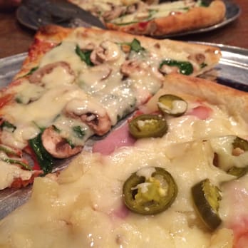 Moon River Pizza - The Pizza in the back and Maui Wow-ee up front (Hawaiian with jalapeños) - Pizza Near Me - Jacksonville, Florida Moon River Pizza - The Pizza in the back and Maui Wow-ee up front (Hawaiian with jalapeños) - Pizza Near Me - Jacksonville, Florida