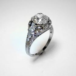 Booth Custom Jewelers - It was an honor to have been part of passing this ring down to the third generation.