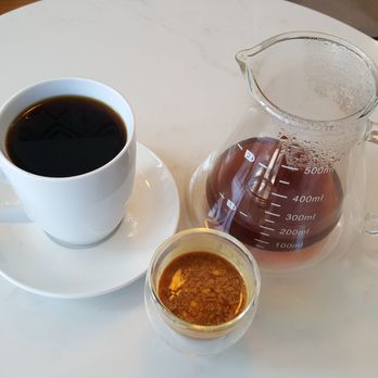 Grinder’s Coffee Bar - Honduras Xela pour over with A Shot of Bliss. - Coffee & Tea Near Me - Houston, Texas Grinder’s Coffee Bar - Honduras Xela pour over with A Shot of Bliss. - Coffee & Tea Near Me - Houston, Texas