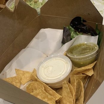 Angela's Cuisine - Nicely wrapped burrito with chips and small salad, tomatillo sauce and cream - Mexican Near Me - Bronx, New York Angela's Cuisine - Nicely wrapped burrito with chips and small salad, tomatillo sauce and cream - Mexican Near Me - Bronx, New York