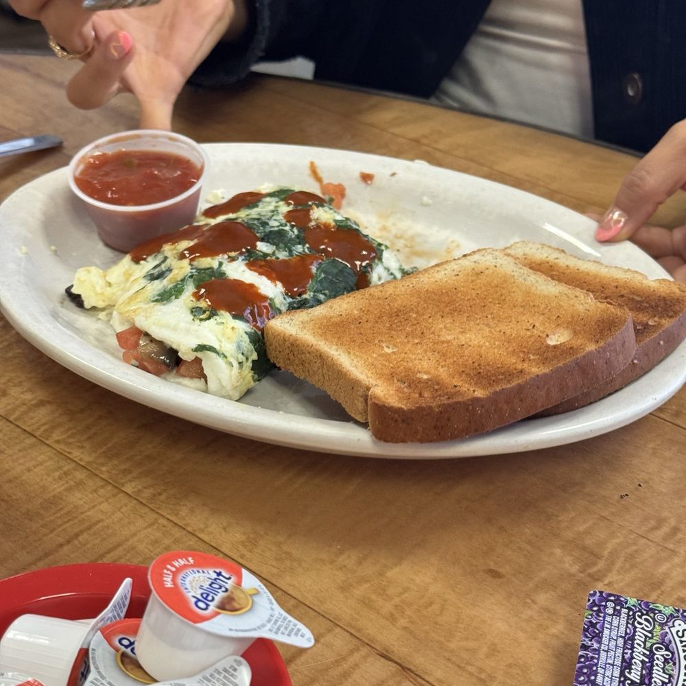 Peppermill Cafe - egg white omelette with spinach and GF toast - Breakfast & Brunch Near Me - Grand Rapids, Michigan Peppermill Cafe - egg white omelette with spinach and GF toast - Breakfast & Brunch Near Me - Grand Rapids, Michigan