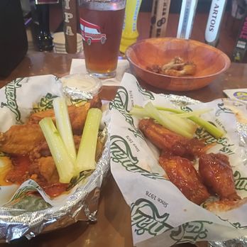 Jeremiah's Tavern - Medium heat wings, done crispy. - New American Near Me - Rochester, New York