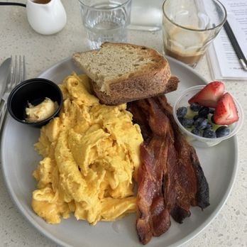 The Heyday - Scrambled eggs, sourdough toast with peace butter, bacon and tiny side fruit - Bars Near Me - Johns Island, South Carolina The Heyday - Scrambled eggs, sourdough toast with peace butter, bacon and tiny side fruit - Bars Near Me - Johns Island, South Carolina