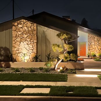 Unique Vision Landscaping - a house at night - Landscaping Near Me Unique Vision Landscaping - a house at night - Landscaping Near Me