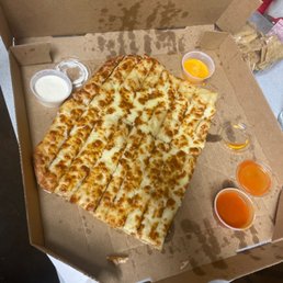 a slice of cheese pizza in a box a slice of cheese pizza in a box