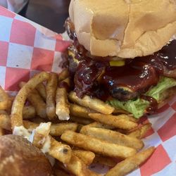 Vinny's Sports Bar and Grill - The Vinny burger, will be circled on the menu, can't miss it! Worth it! Excuse the pretzel stick and cheese mix with my fries.