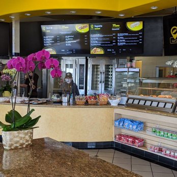 La Ca Bakery & Cafe - Their counter. You can also find several nice kinds of Vietnamese small trays of food to the left of the register - Vietnamese Near Me - Hayward, California