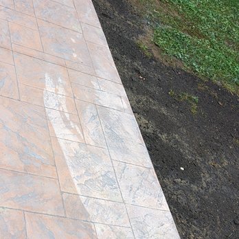 Leyva’S - The original splodge. Note the extra spots and splashes above the larger spot. Those are permanent, too. - Masonry/Concrete Near Me