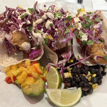 Copper Door - Fish tacos, flakey, lightly battered haddock. Outstanding. - New American Near Me - Bedford, New Hampshire Copper Door - Fish tacos, flakey, lightly battered haddock. Outstanding. - New American Near Me - Bedford, New Hampshire