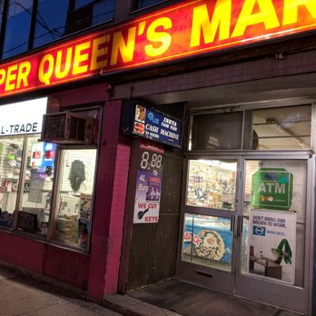 Super Queens Market - Outside the front entrance on the sidewalk in the evening. May 2018 - Grocery Near Me - Toronto, Ontario Super Queens Market - Outside the front entrance on the sidewalk in the evening. May 2018 - Grocery Near Me - Toronto, Ontario