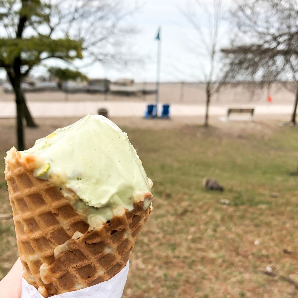 Ed's Real Scoop - Pistachio ice cream being eaten down by the beaches - Ice Cream & Frozen Yogurt Near Me - Toronto, Ontario