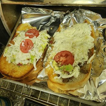 The SCV HUB - two hot dogs with toppings - Food Court Near Me - Santa Clarita, California The SCV HUB - two hot dogs with toppings - Food Court Near Me - Santa Clarita, California