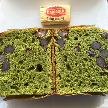 Fresh Flours - Matcha Green Tea Azuki Muffin halved with butter - Coffee & Tea Near Me - Seattle, Washington Fresh Flours - Matcha Green Tea Azuki Muffin halved with butter - Coffee & Tea Near Me - Seattle, Washington