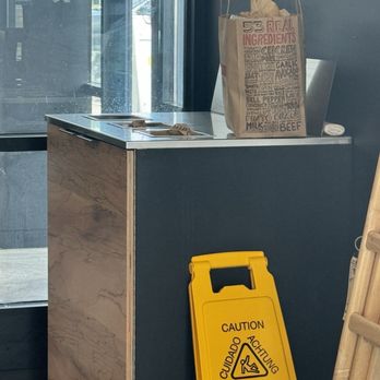 Chipotle Mexican Grill - Full garbage bins. - Mexican Near Me - Commerce Township, Michigan