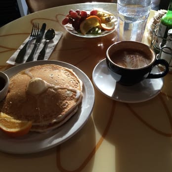 The Daisy Cafe - Classic short stack, fruit and a latte - American Near Me - Bellingham, Washington The Daisy Cafe - Classic short stack, fruit and a latte - American Near Me - Bellingham, Washington