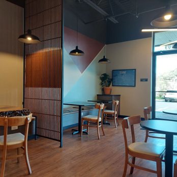Dialogue Coffee House - tables and chairs in a coffee shop - Coffee & Tea Near Me - Topeka, Kansas