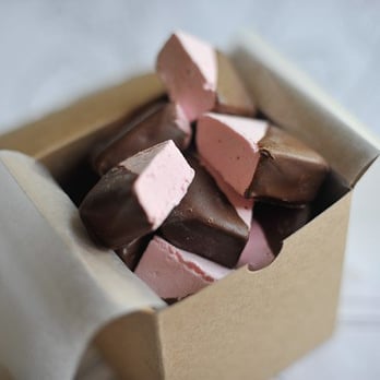 The Bang Candy Company - Rose Cardamom Marshmallow half dipped in Belgian Milk Chocolate - Desserts Near Me - Nashville, Tennessee The Bang Candy Company - Rose Cardamom Marshmallow half dipped in Belgian Milk Chocolate - Desserts Near Me - Nashville, Tennessee