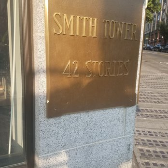 Smith Tower Observatory Bar - Signage, entrance is to the left of it. - Cocktail Bars Near Me - Seattle, Washington Smith Tower Observatory Bar - Signage, entrance is to the left of it. - Cocktail Bars Near Me - Seattle, Washington