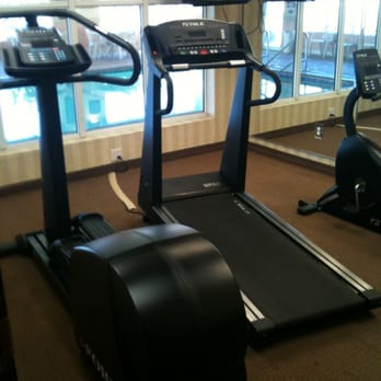 Holiday Inn Express Toledo-Oregon - Workout facing pool - Hotels Near Me - Oregon, Ohio